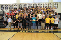 Jim Jensen presents NFL Golden Football to Central Bucks High School West